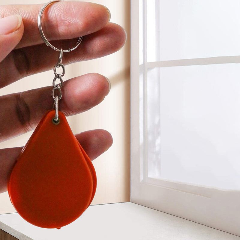 Opvouwbare sleutelhanger met vergrootglas