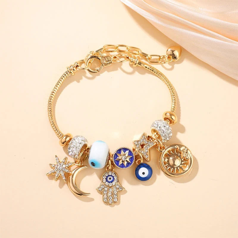 Stella – Verstelbare Hemelse Bedelarmband met Gouden Glans