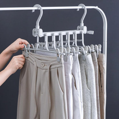 Opvouwbare kleerhanger en broekenrek