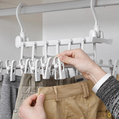 Opvouwbare kleerhanger en broekenrek