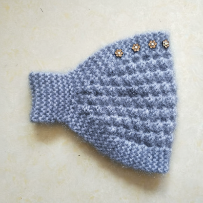 Grace – Gezellig gebreide hoofdband met bloemmotief en open bovenkant ontwerp