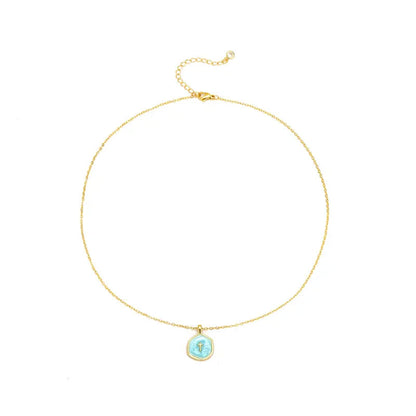 Arianna – Ketting met kruis hanger van roestvrij staal met parelmoer glans