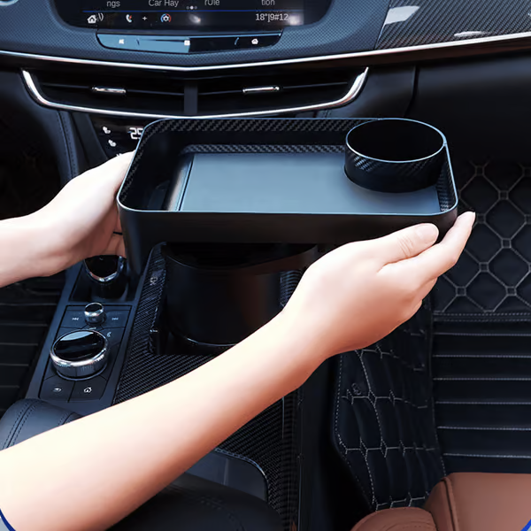 Verlenging van de bekerhouder in het voertuig