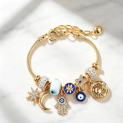 Stella – Verstelbare Hemelse Bedelarmband met Gouden Glans