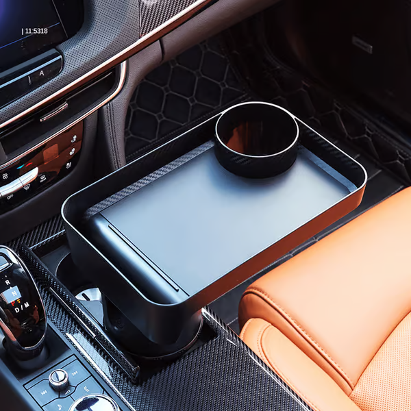 Verlenging van de bekerhouder in het voertuig