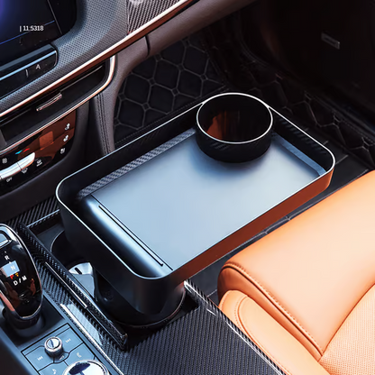 Verlenging van de bekerhouder in het voertuig