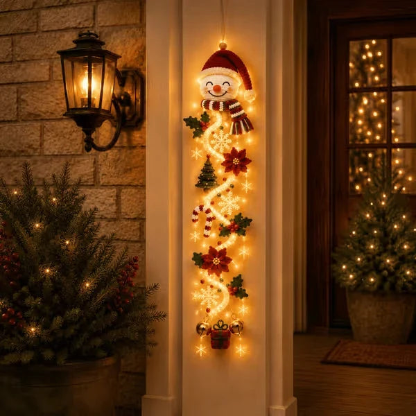 LuminaFest kerstdeurbekleding — warme gloed, instant magie