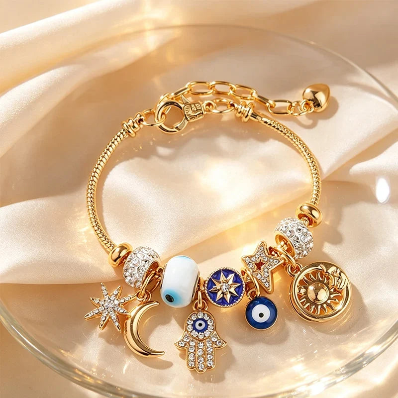 Stella – Verstelbare Hemelse Bedelarmband met Gouden Glans