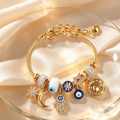 Stella – Verstelbare Hemelse Bedelarmband met Gouden Glans