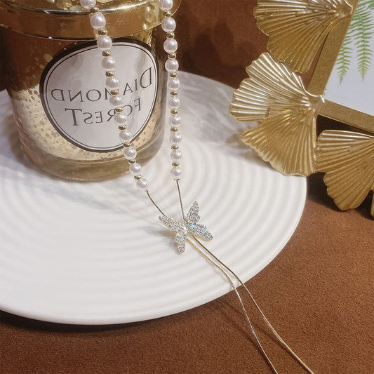 Verstelbare ketting met vlinderparel
