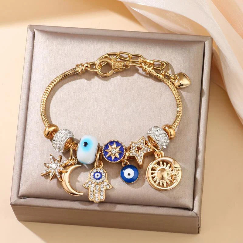 Stella – Verstelbare Hemelse Bedelarmband met Gouden Glans