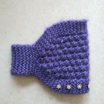 Grace – Gezellig gebreide hoofdband met bloemmotief en open bovenkant ontwerp