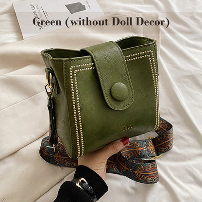 Vintage modetas met verstelbare riem