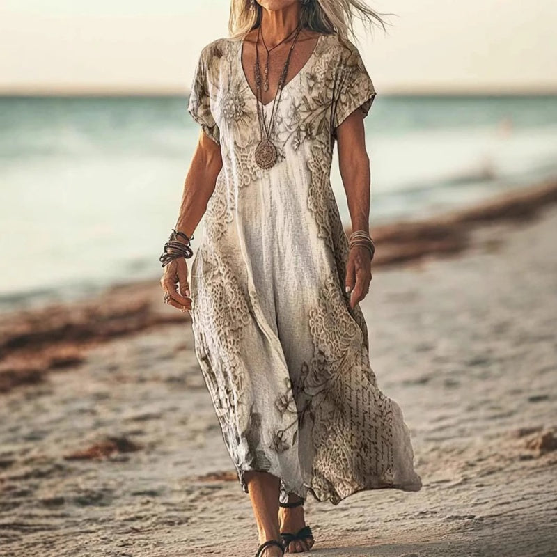 Bedrukte jurk met korte mouwen en lange V-hals voor dames